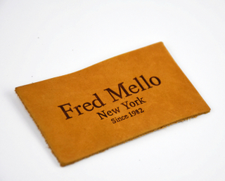 Custom embossed jeans clothing PU leather labels tags wholesale in China