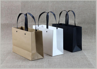 High quality black paper bag/Kraft paper bag/Handbags in EECA Packaging