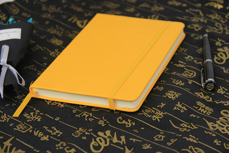 Custom yellow leather notebook can be used for office, business writing in EECA