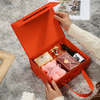 Wholesale Portable Folding Flip Paper Orange Green Gift Cosmetics Skin Care Product Packaging Box with Ribbon Handle