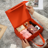 Wholesale Portable Folding Flip Paper Orange Green Gift Cosmetics Skin Care Product Packaging Box with Ribbon Handle